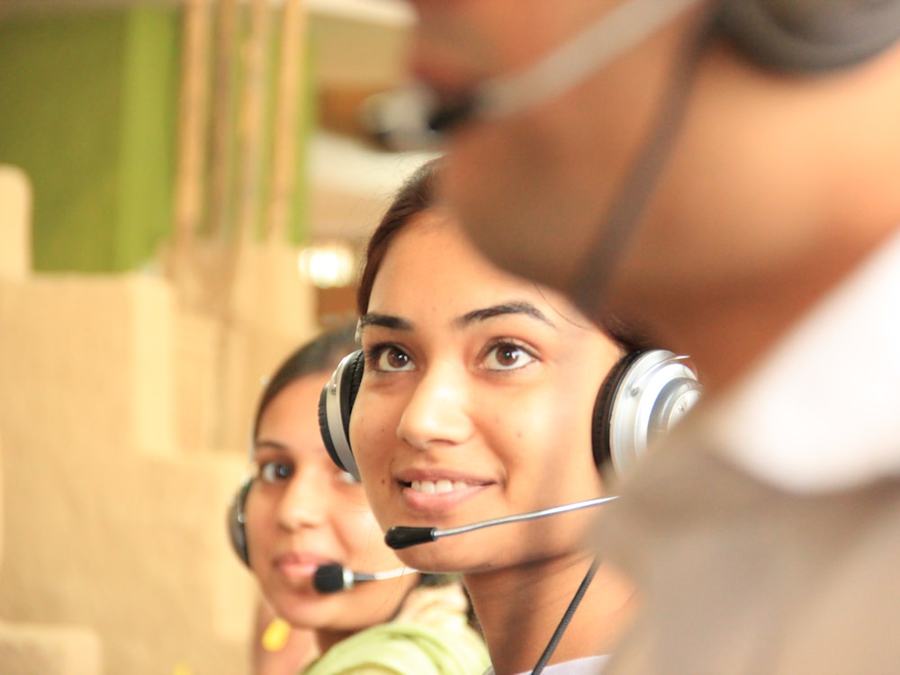 Contact centre team wearing headsets handling customer payment calls
